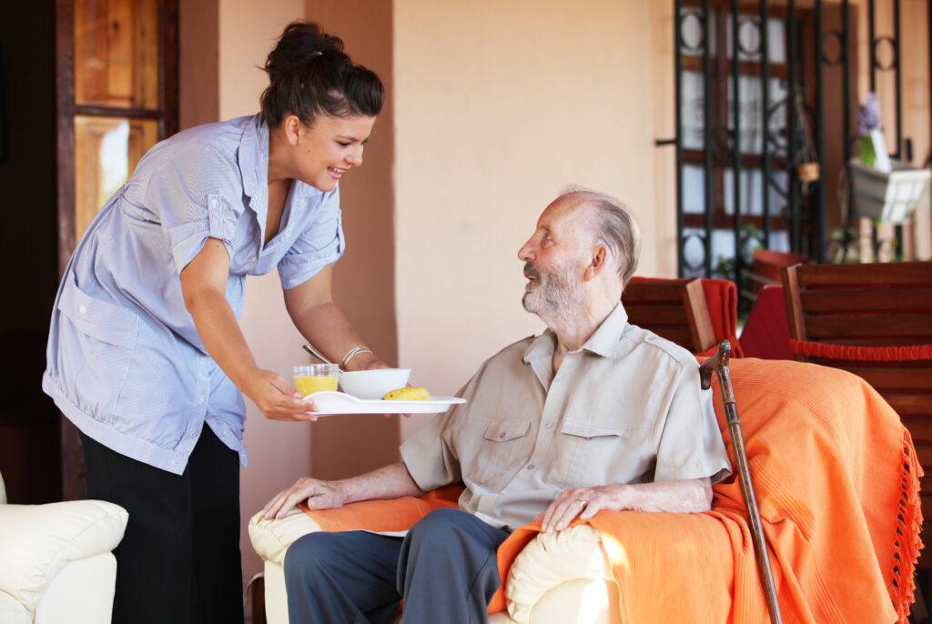 elderly and nurse or carer